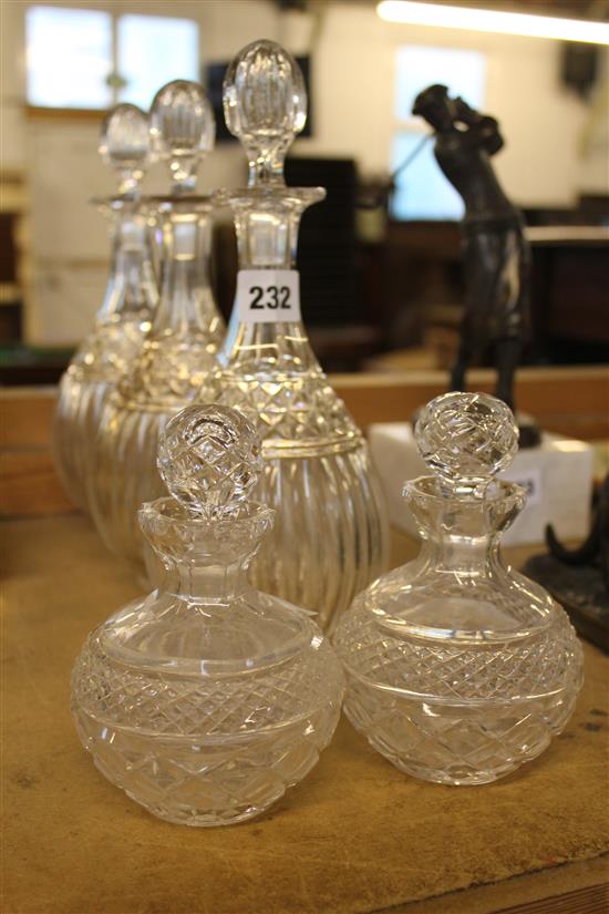 Five glass decanters